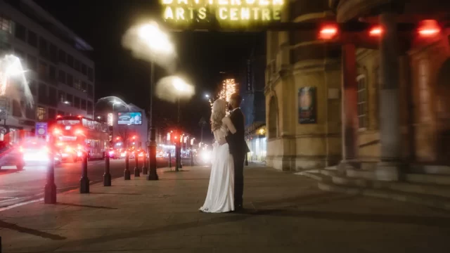 Couple in front of Battersea Arts Centre at night, Battersea Arts Centre. Photography by Wedding Photography